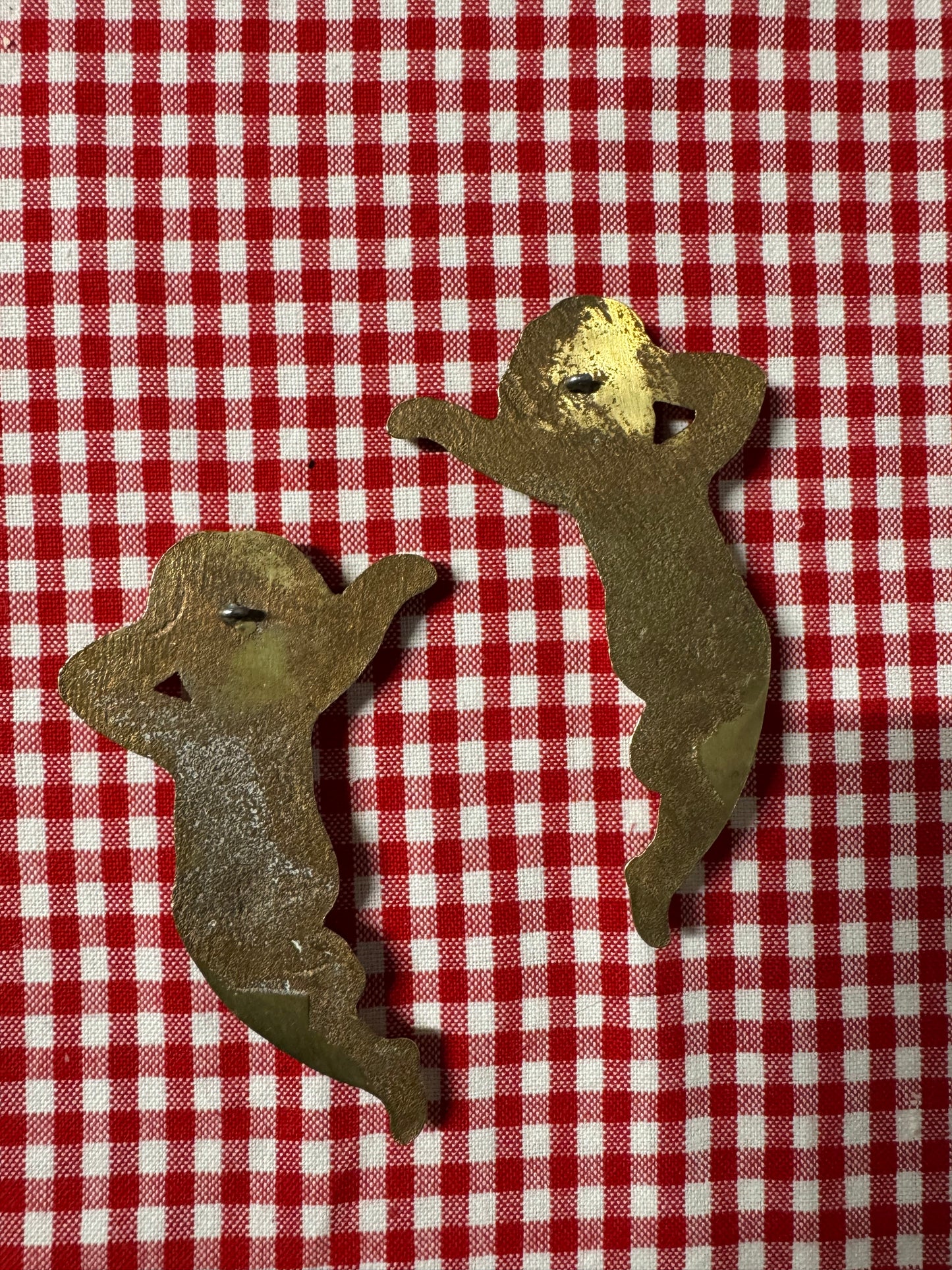 Änglar i mässing med lite tyngd