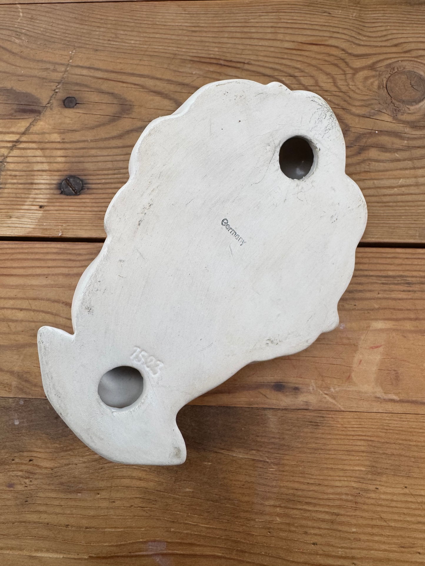 Väggskulptur ansikte