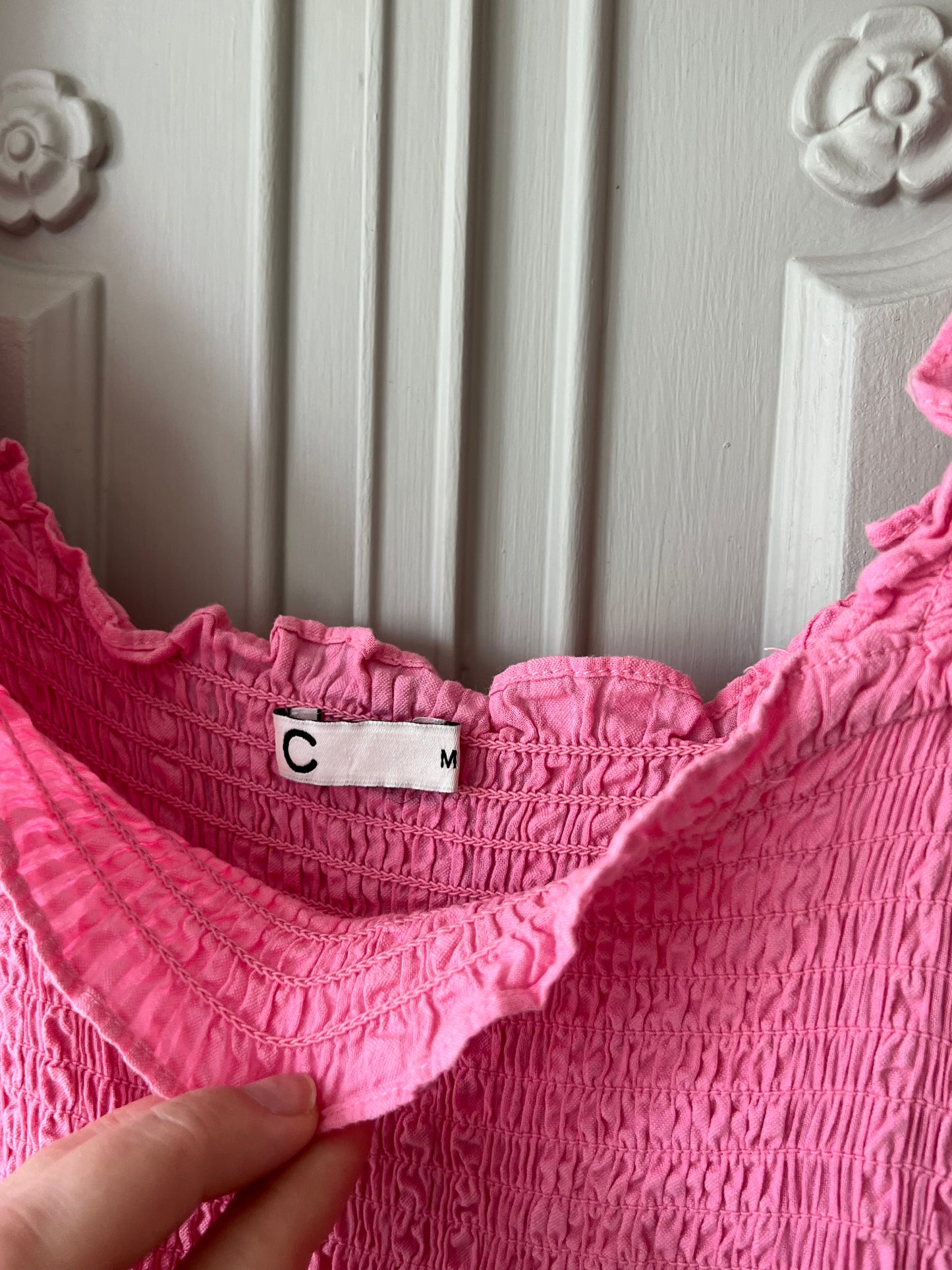 Rosa krinklad klänning