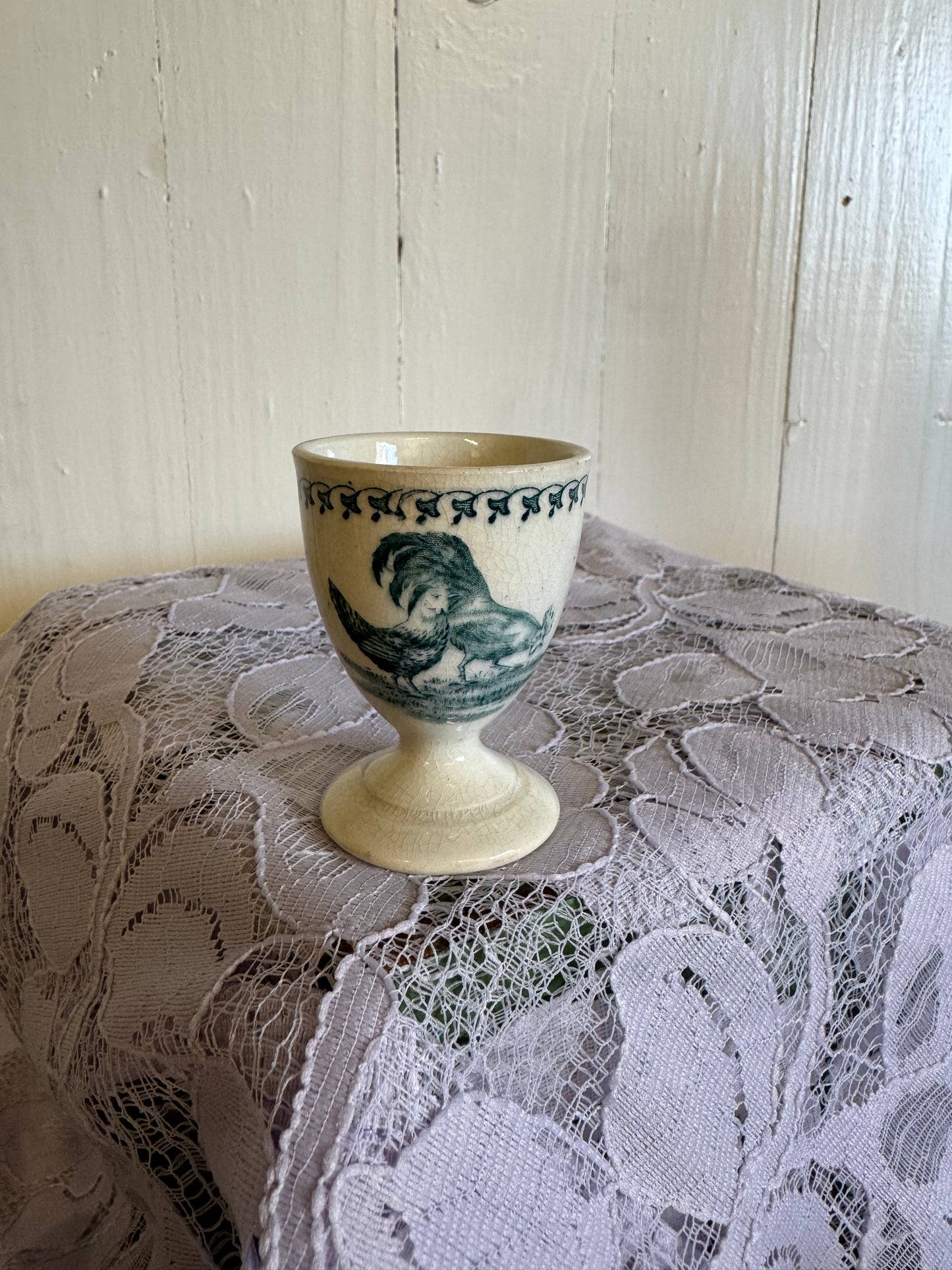 Äldre grön äggkopp, hönor