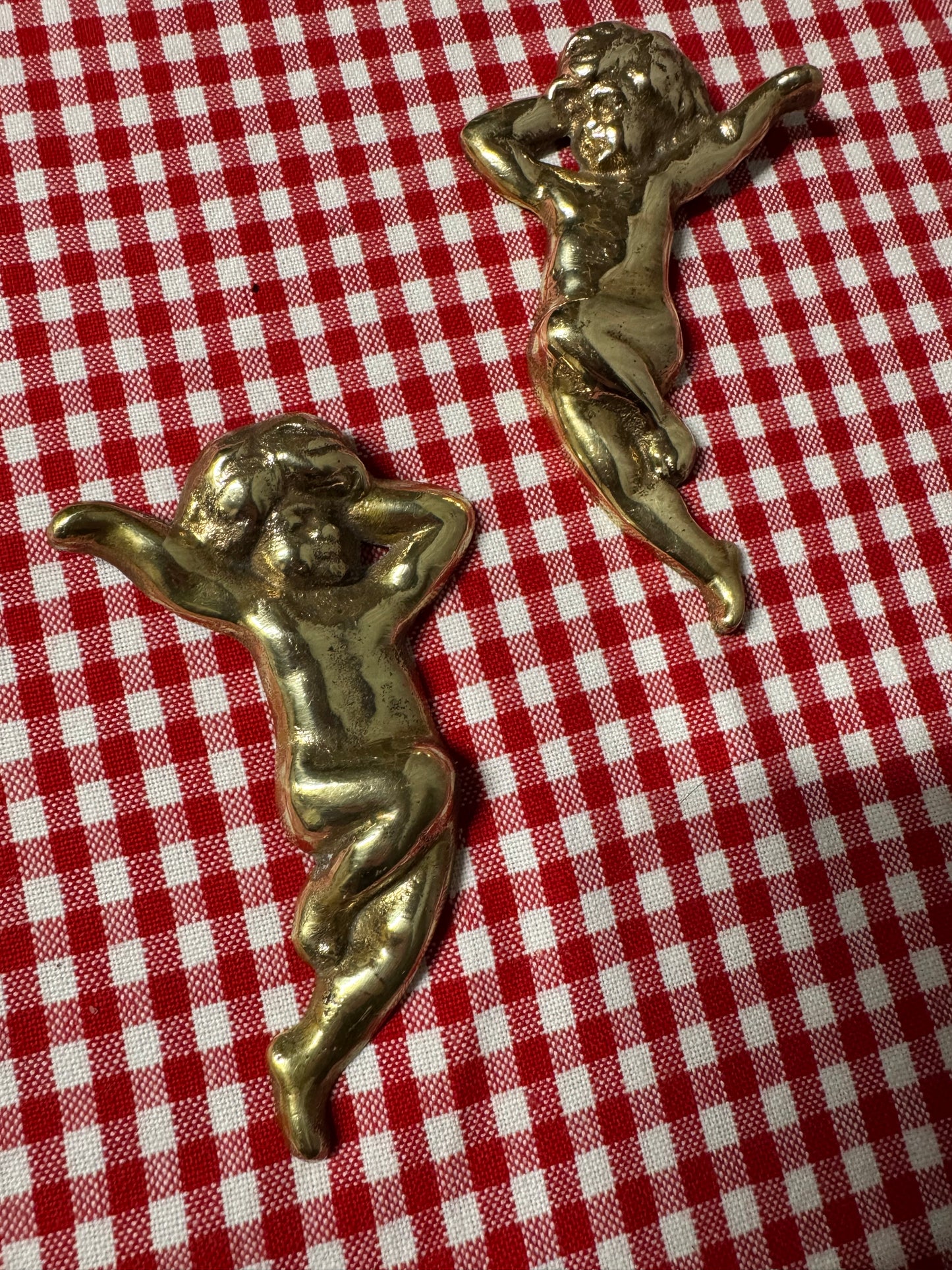 Änglar i mässing med lite tyngd