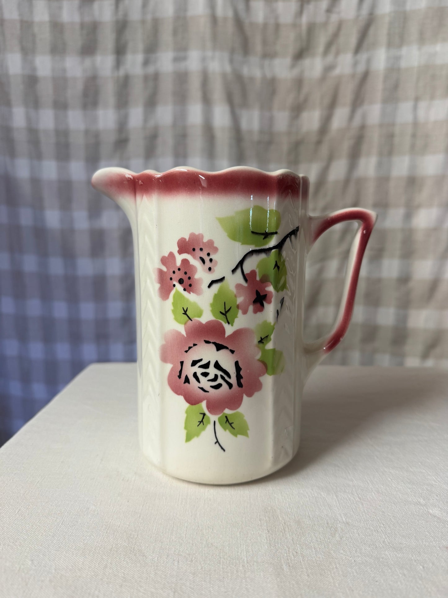 Kanna i grönt och rosa