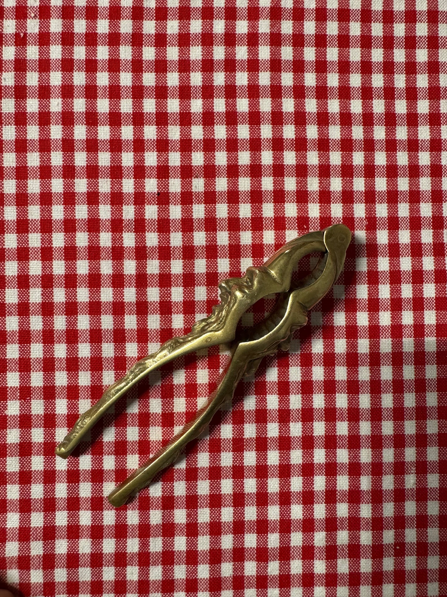 Äldre nötknäckare 1900-tal, ansikten i mässing