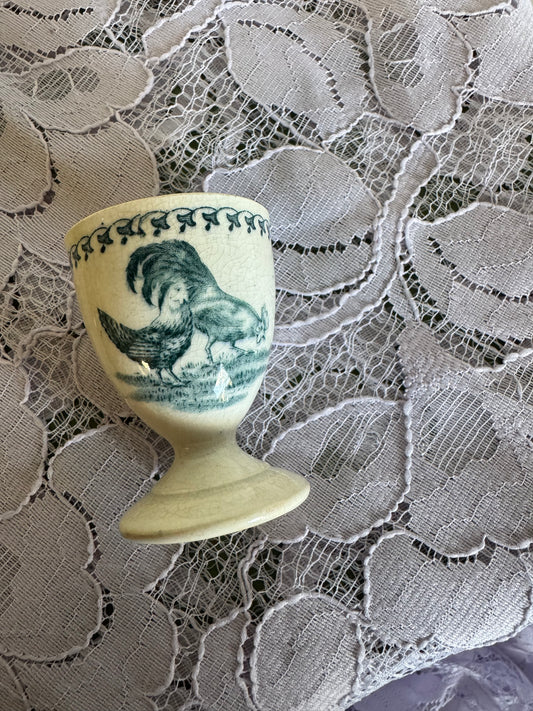 Äldre grön äggkopp, hönor