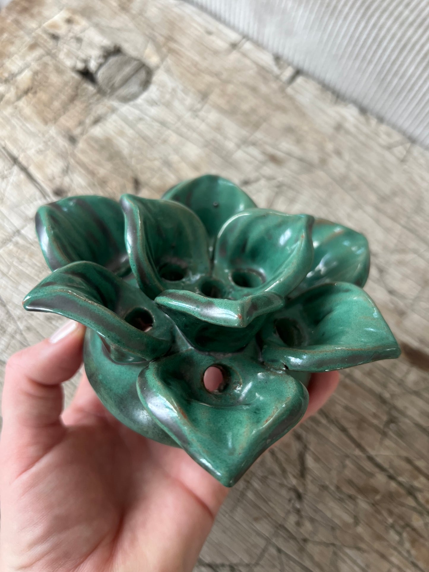 Blomsterfakir i grön keramik