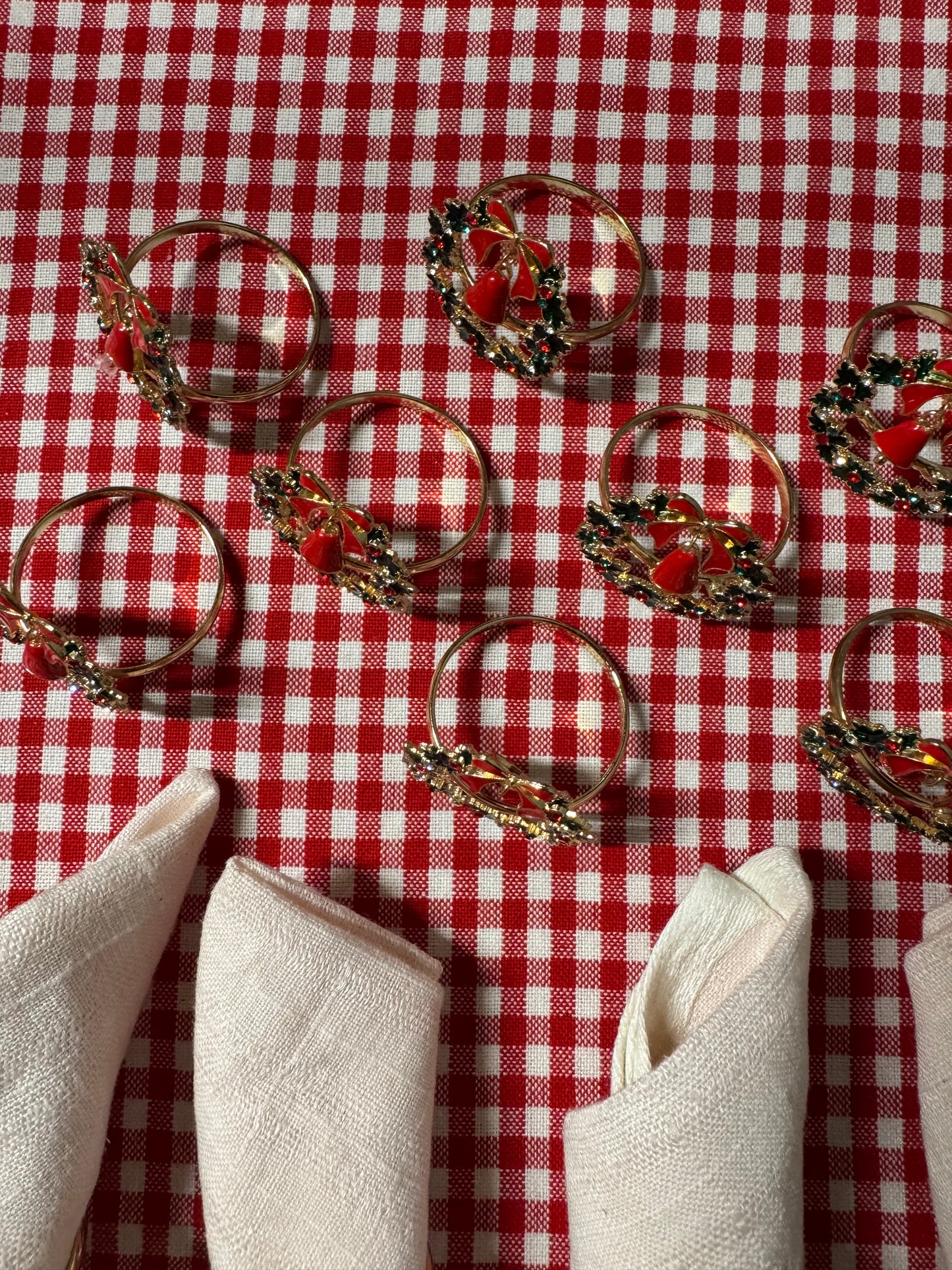 12 st servettringar med krans med bjällra och rosett