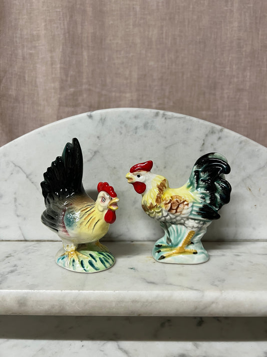 Äldre tupp och höna i porslin