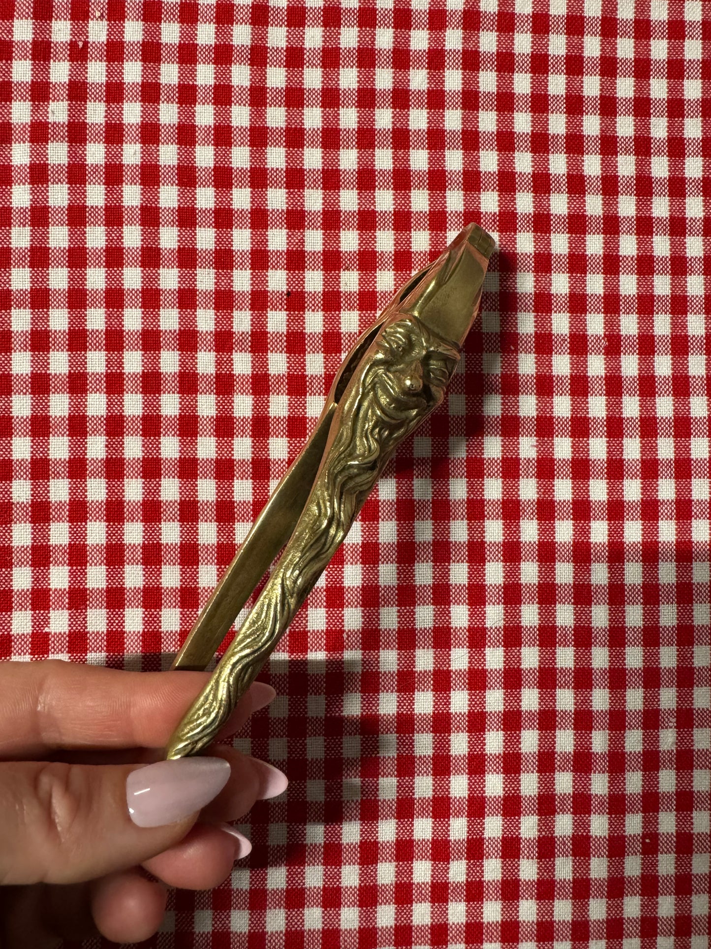 Äldre nötknäckare 1900-tal, ansikten i mässing