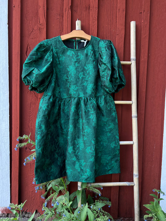 Smaragdgrön puffklänning