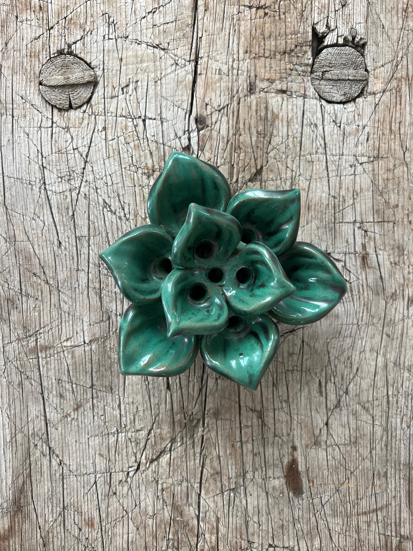 Blomsterfakir i grön keramik