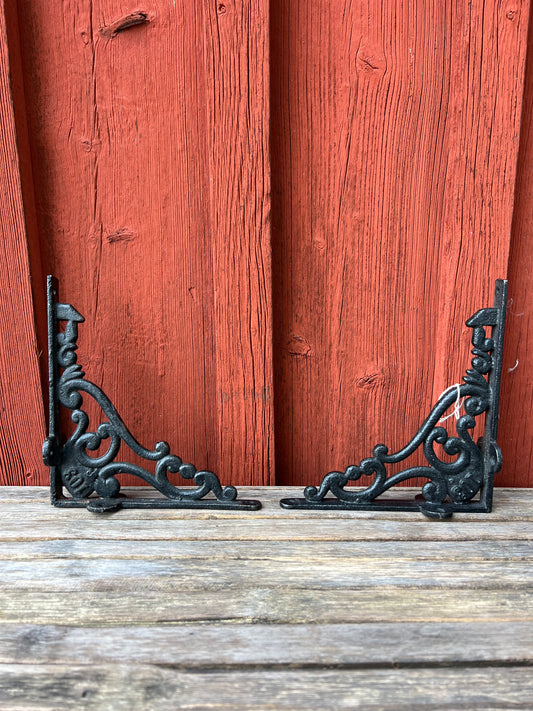 Paret konsoler i gjutjärn