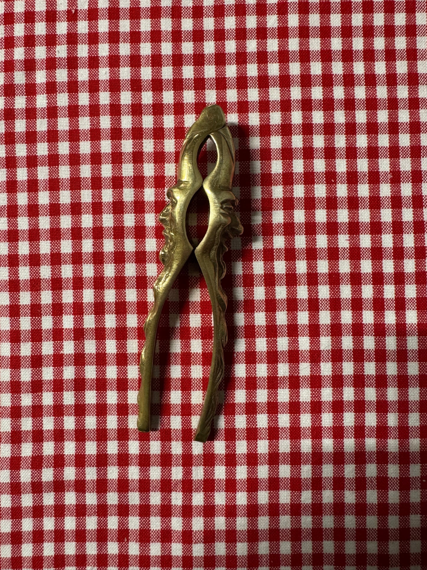 Äldre nötknäckare 1900-tal, ansikten i mässing