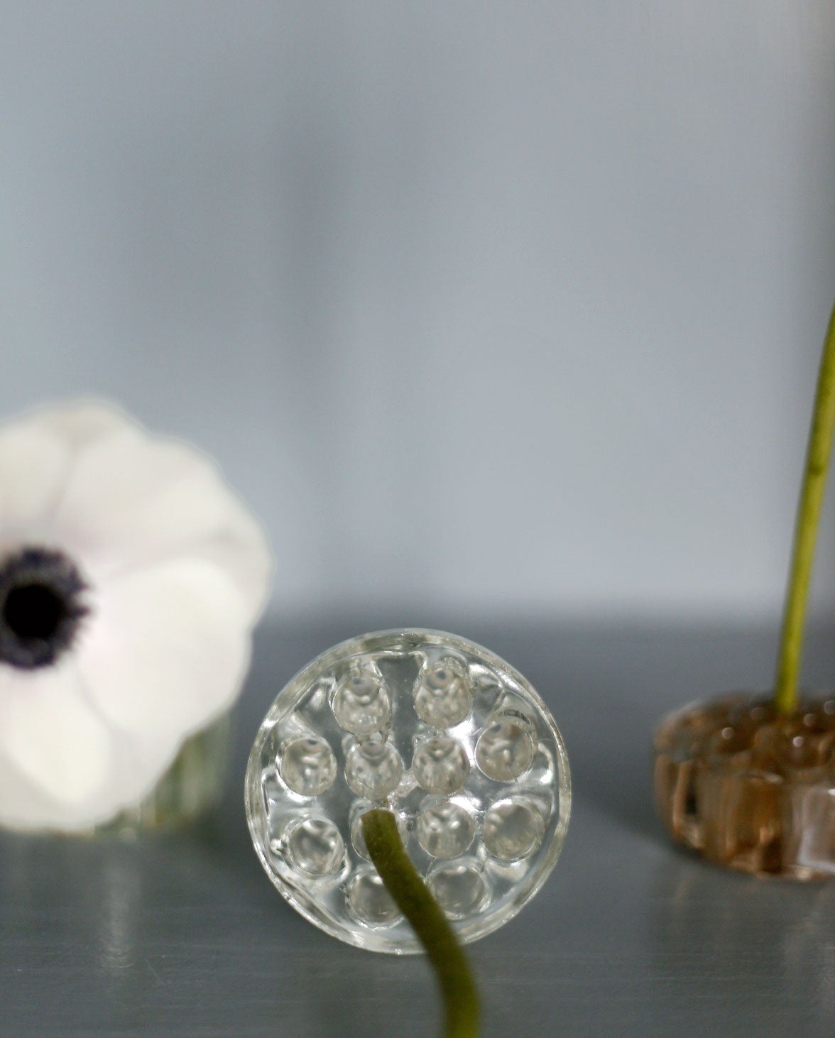 En blomsterfakir i klarglas - Ikebana