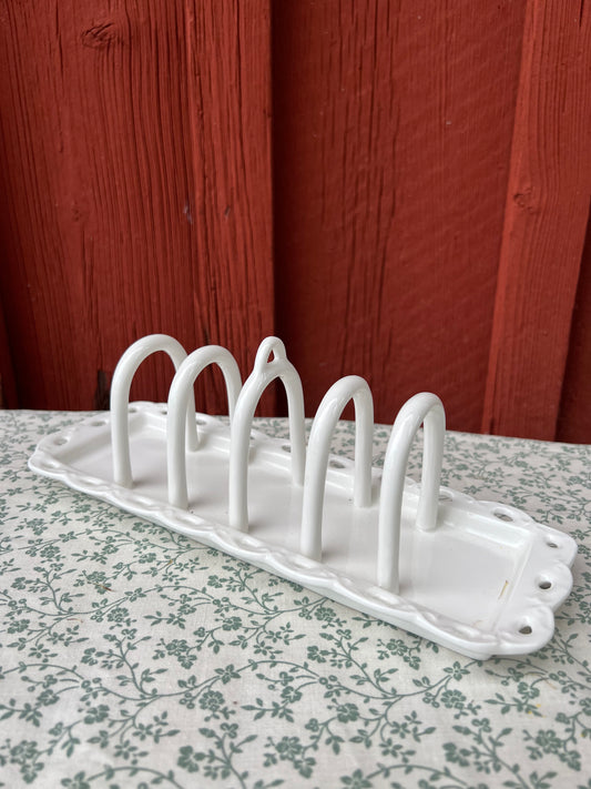 Toastbrödhållare i vitt porslin