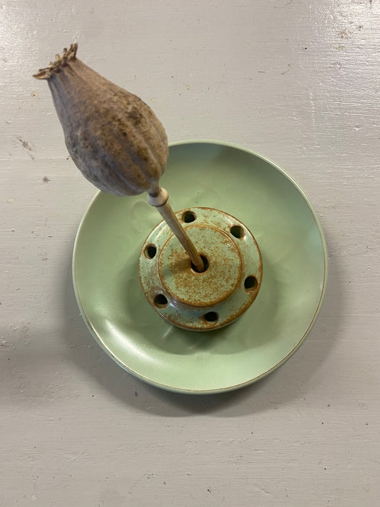 Blomsterfakir med fat i grönt