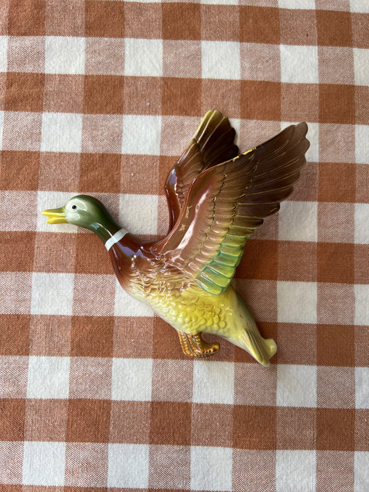 Väggdekor and i porslin