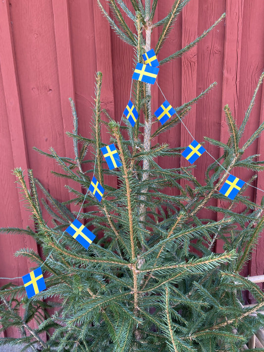 Äldre flaggspel till julgranen