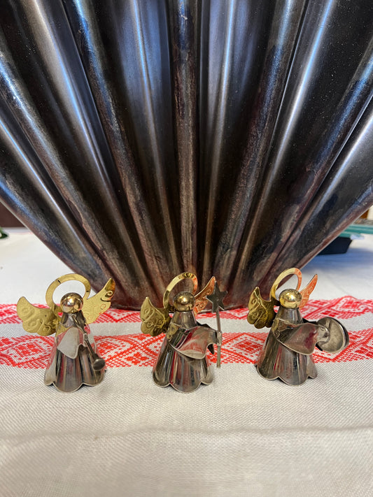 Triss i änglar som spelar instrument